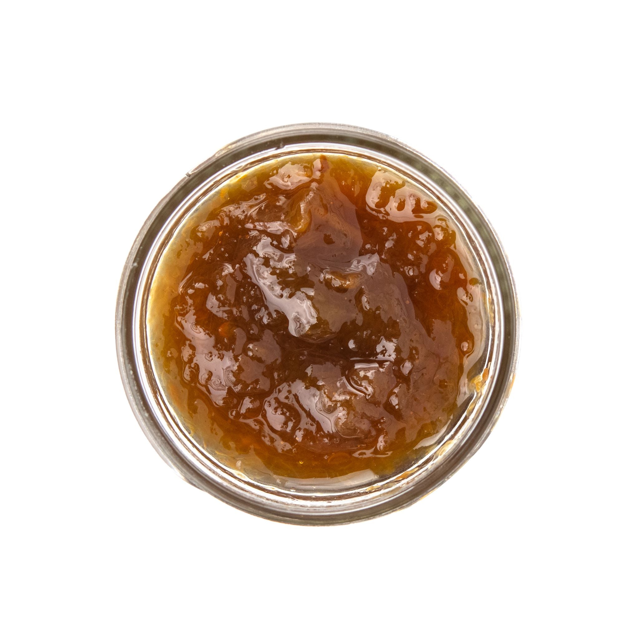 inside mini jar of green plum jam with Absinthe 