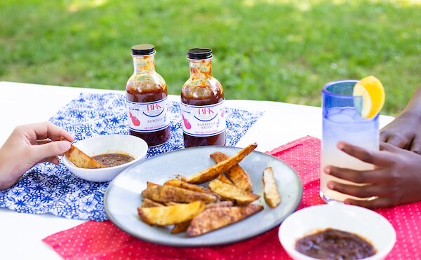 bottles of farm ketchup and BBQ sauce from Beth's Farm Kitchen lifestyle